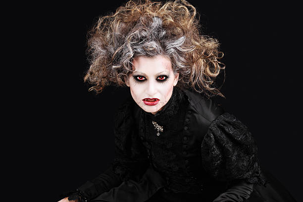 istock vampire woman portrait, halloween make up 492783030