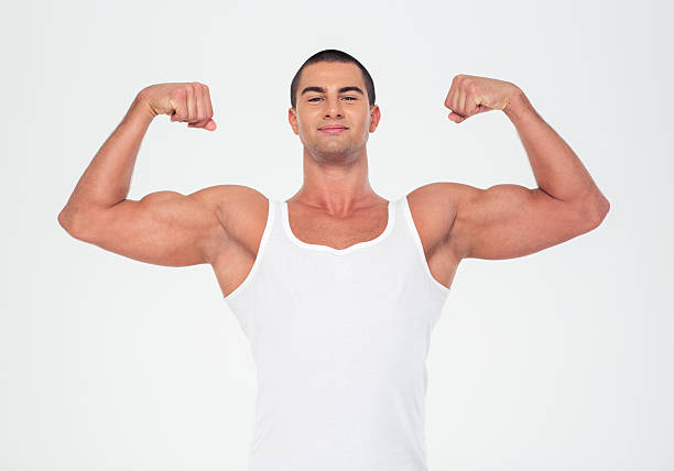 istock Happy muscular man showing his biceps 492785866