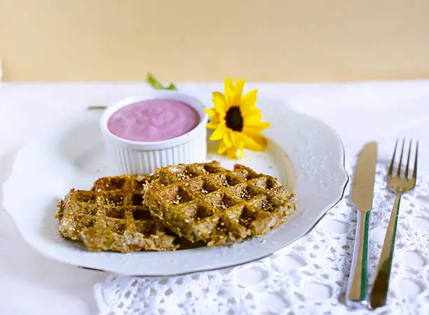 Photo of Apple and sweet potato waffles with sesame and blueberry dip