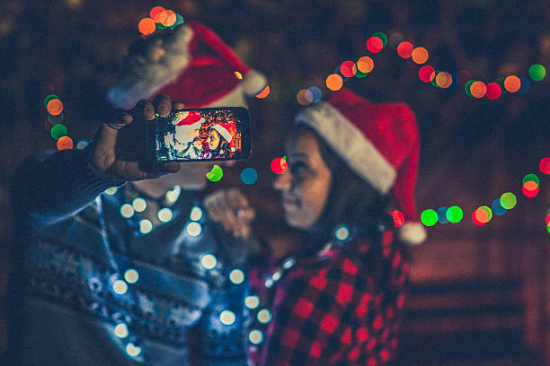 istock New year's eve selfie 492786968