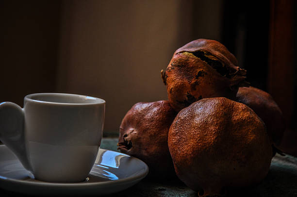 greek coffee and pomegranate in atmospheric light