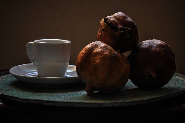 greek coffee and pomegranate in atmospheric light