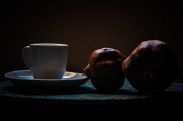 greek coffee and pomegranate in atmospheric light