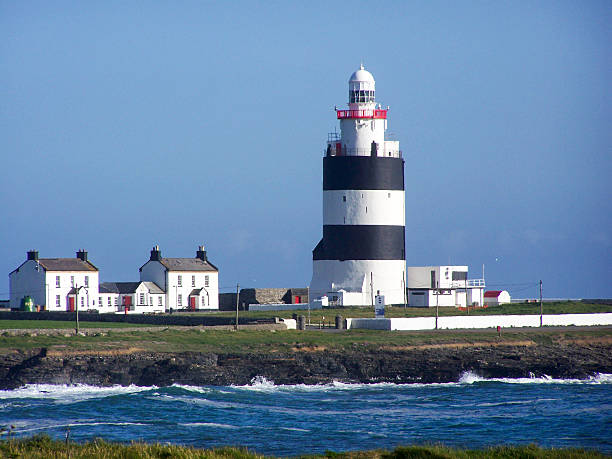 istock Black and white Irish light house 492793311
