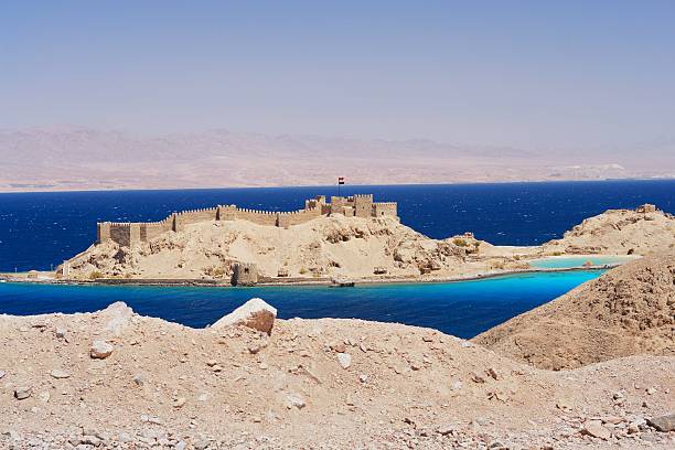 Taba, Egypt View of Pharaoh's Island and Saudi Arabia, Egypt taba stock pictures, royalty-free photos & images