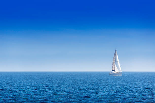 Sailing ship yachts with white sails Sailing ship yachts with white sails, deep blue sky sailboat sports race yachting yacht stock pictures, royalty-free photos & images