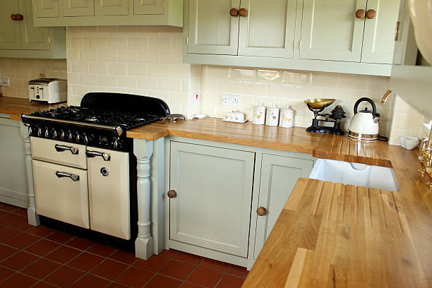 istock Traditional country kitchen, range-cooker, Belfast / butler ceramic-sink, painted cabinets 492796253