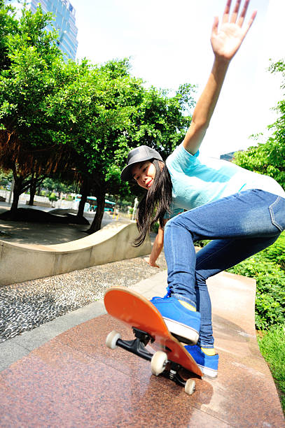 istock skateboarding woman 492797595