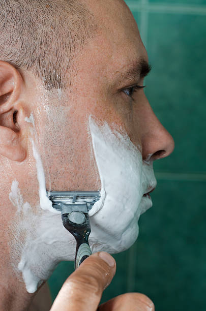 istock man shaving in the bathroom 492797717