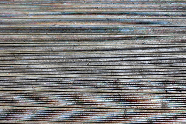 istock Image of weathered decking timber with no staining or preservatives 492798787