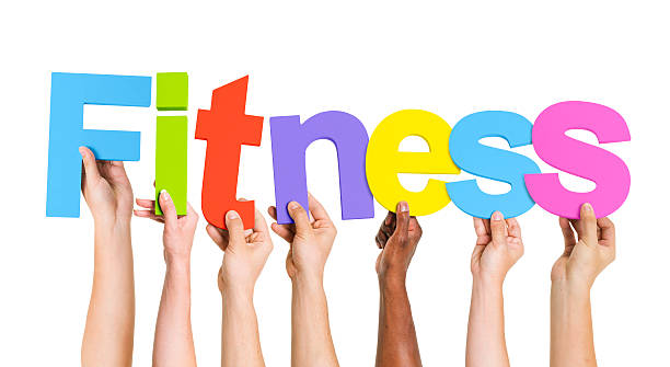istock Multiethnic Hands Holding Text Fitness 492799257