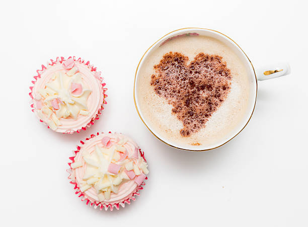 istock Cup of coffee and  cake isolated on white 492802418