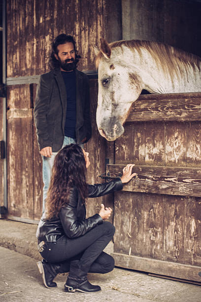 istock Young Couple Enjoying a Day on a Farm 492802768