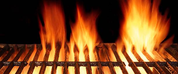 istock Empty BBQ Cast Iron Hot Grill With Burning Charcoal Fire 492803050