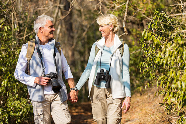 istock mature couple hiking in mountain 492805014