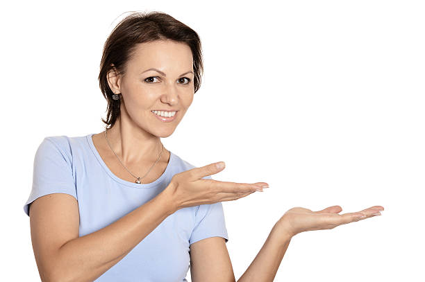istock Brunette woman showing copy space 492805488