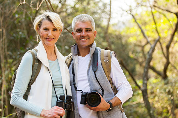 istock hikers couple enjoying outdoor activity 492808402