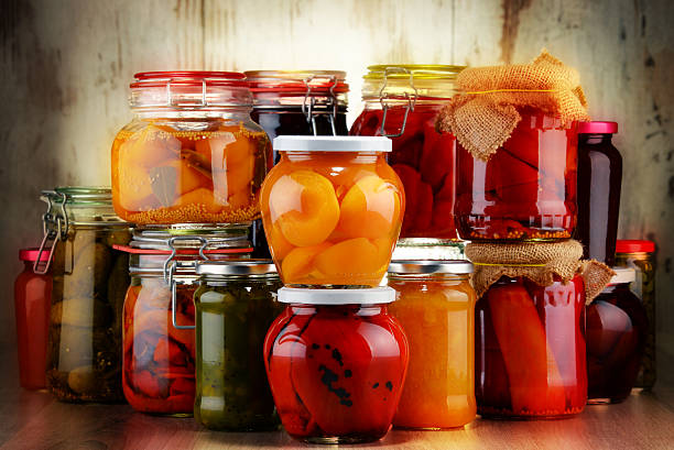 istock Jars with pickled vegetables and fruity compotes 492808704