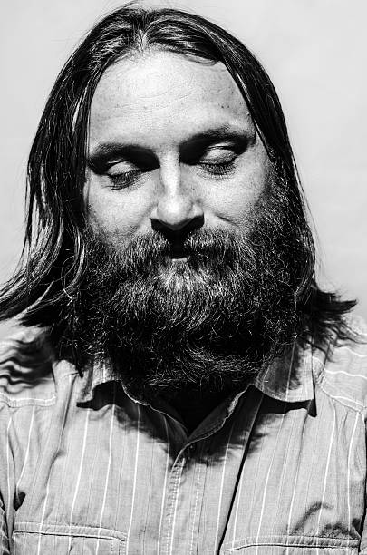 istock brunette man portrait black and white isolated 492809212