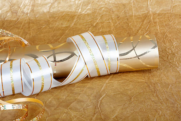 istock Rolls of multicolored wrapping paper for gifts 492809242