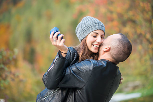 istock Autumn outdoor wedding proposal engagement 492809916