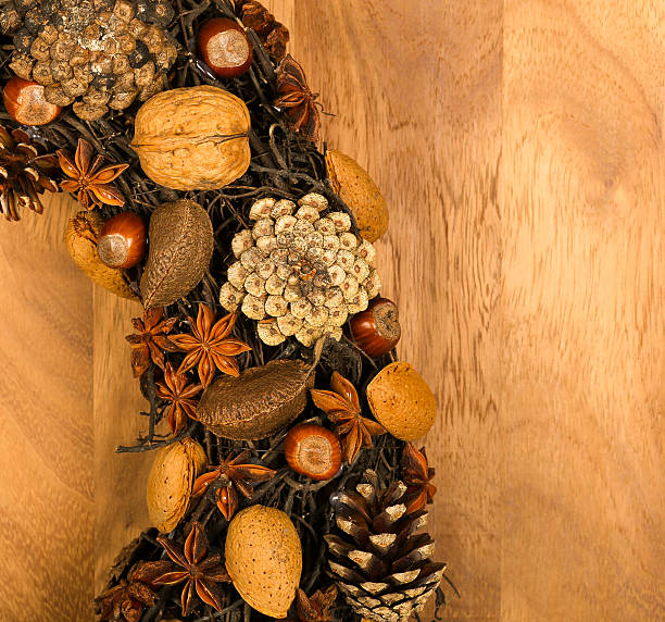 istock Christmas Wreath Decoration Pine Cones Almonds Anise Stars Hazel 492810728