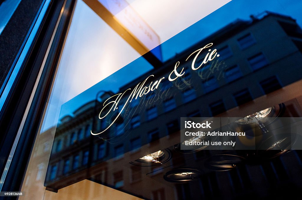 H. Moser and Cie sign Vienna, Austria - July 4, 2011: H. Moser and Cie sign located in the famous Kohlmarkt street in Vienna. H. Moser and Cie s is a line of luxury, designer jewelry sold in upscale boutiques. 2015 Stock Photo