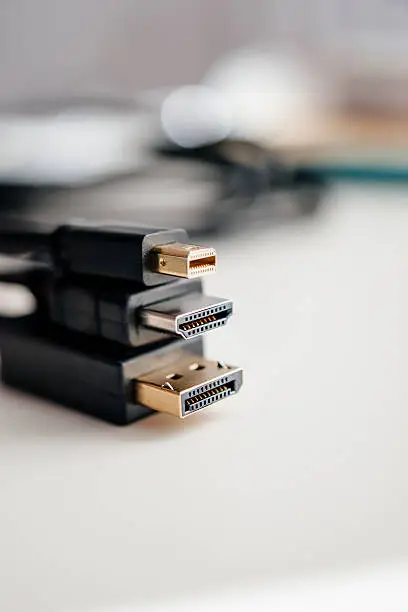 Photo of Mini DisplayPort, HDMI and DVi cables connectors