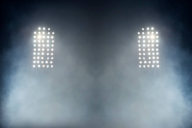 istock Stadium lights against dark night sky backgroundon 492815705