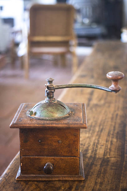 istock Vintage manual coffee grinder table old house 492816248