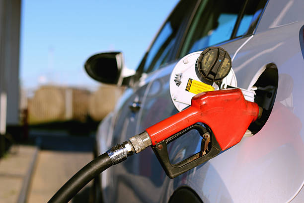 istock Gun petrol in the tank to fill 492816270