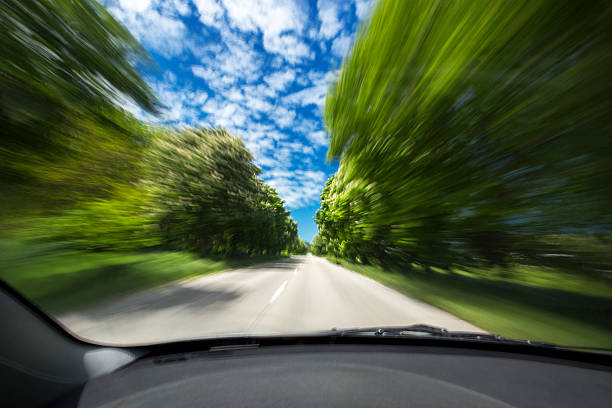 istock Car on the road with motion blur background 492816467