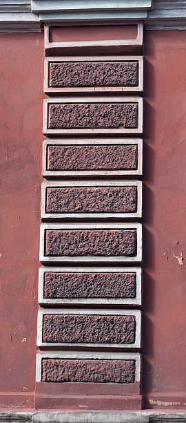 istock Detail of old red wall with column 492816775