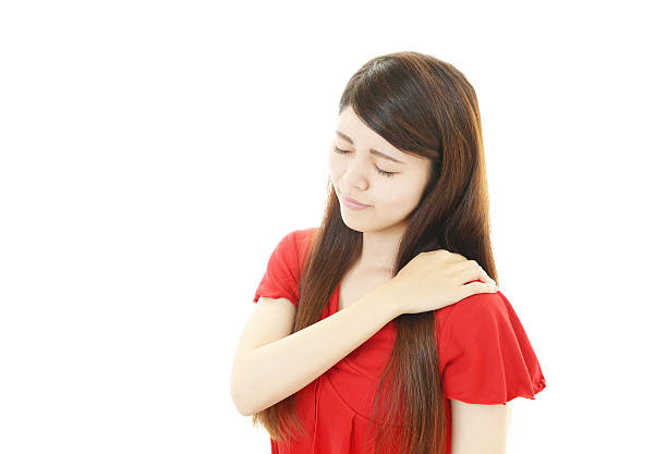 istock Woman with shoulder neck pain. 492818259