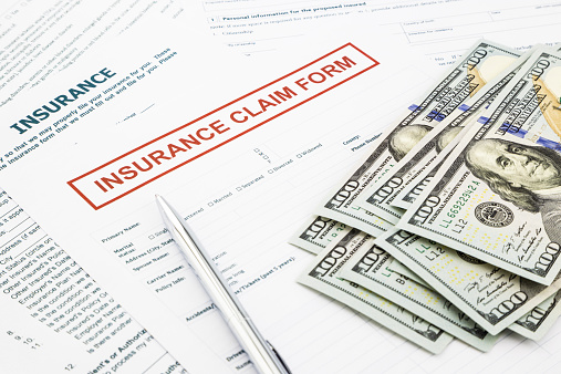 Insurance claim form and compensate money, accidental and insurance concepts