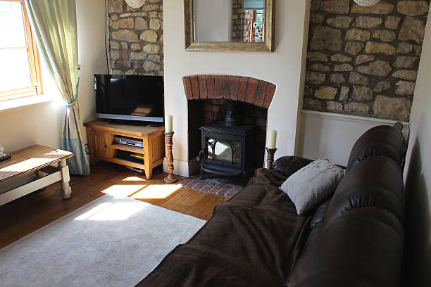 istock Image of traditional cottage sitting room / lounge, with leather sofa 492819297