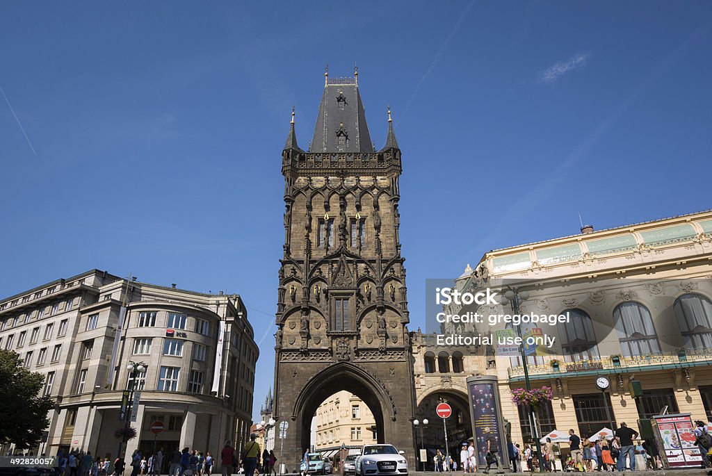 Powder Tower in Prague, Czech Republic Prague, Czech Republic - August 17, 2014: People meander about the streets and sidewalks outside Powder Tower, a gothic tower dating from the 11th century that is one of the original city gates leading to the Old Town of Prague. Building Exterior Stock Photo