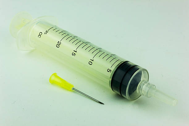 seringue - surgical needle syringe prick injecting photos et images de collection