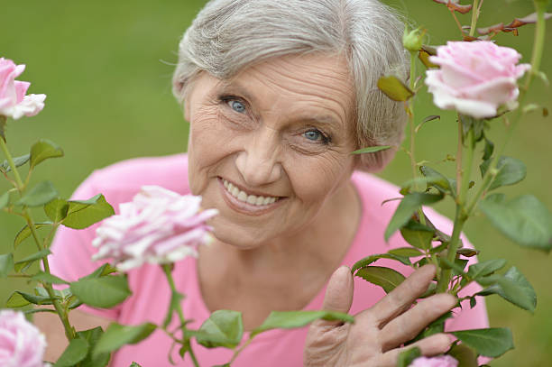 istock Woman with pink roses 492839960