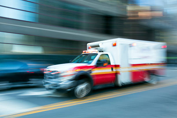 flashing lights from UK emergency vehicles in the dark