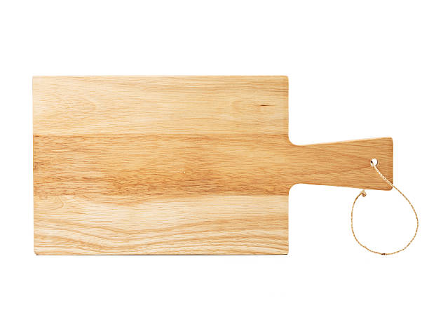 istock wooden cutting board isolated on white 492840526