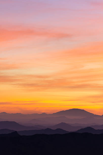 Landscape Fog and Mountain on Sunset
