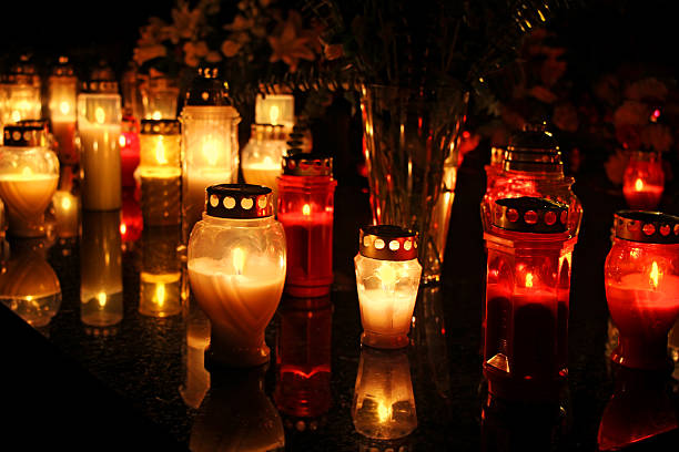 istock Candles Burning At a Cemetery 492841924