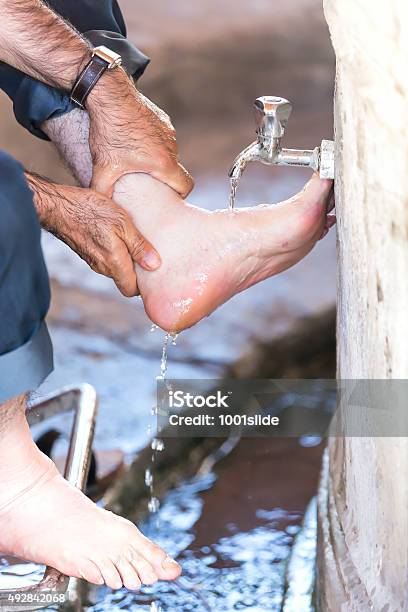 Man Performing Wudu Before Pray Stock Photo - Download Image Now - Muslim Ablution, 2015, Adult
