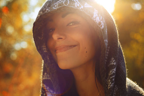 Beautiful woman in Autumn scenery.