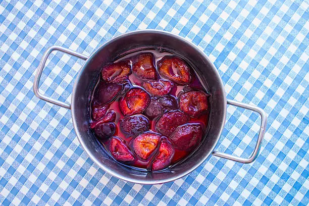 Pan with plum jam or compot from above