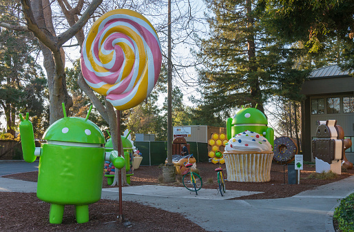 Mountain View, CA, USA - February 16, 2015: Android replicas in Google campus, Mountain View, CA on Feb 16, 2015. Google is a multinational company specializing in Internet related services and products.
