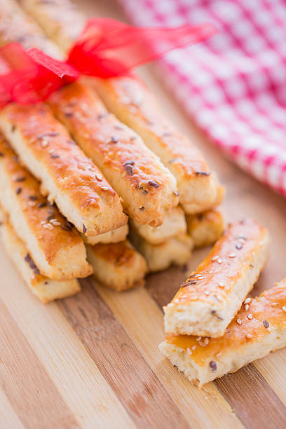 Bread Salty Grissini Sticks with sesame and flax seeds stock photo