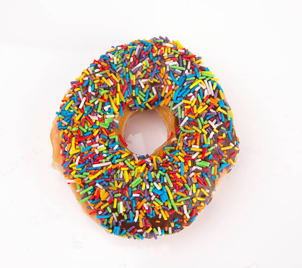 istock Donut with sprinkles isolated on white background 492850018