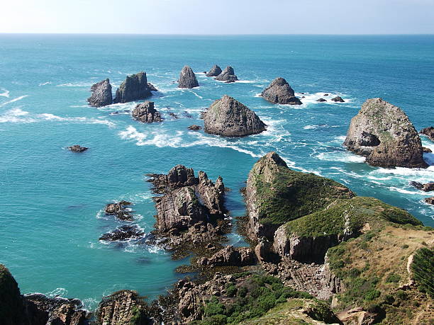 istock cliff Caitlins, New Zealand 492850364